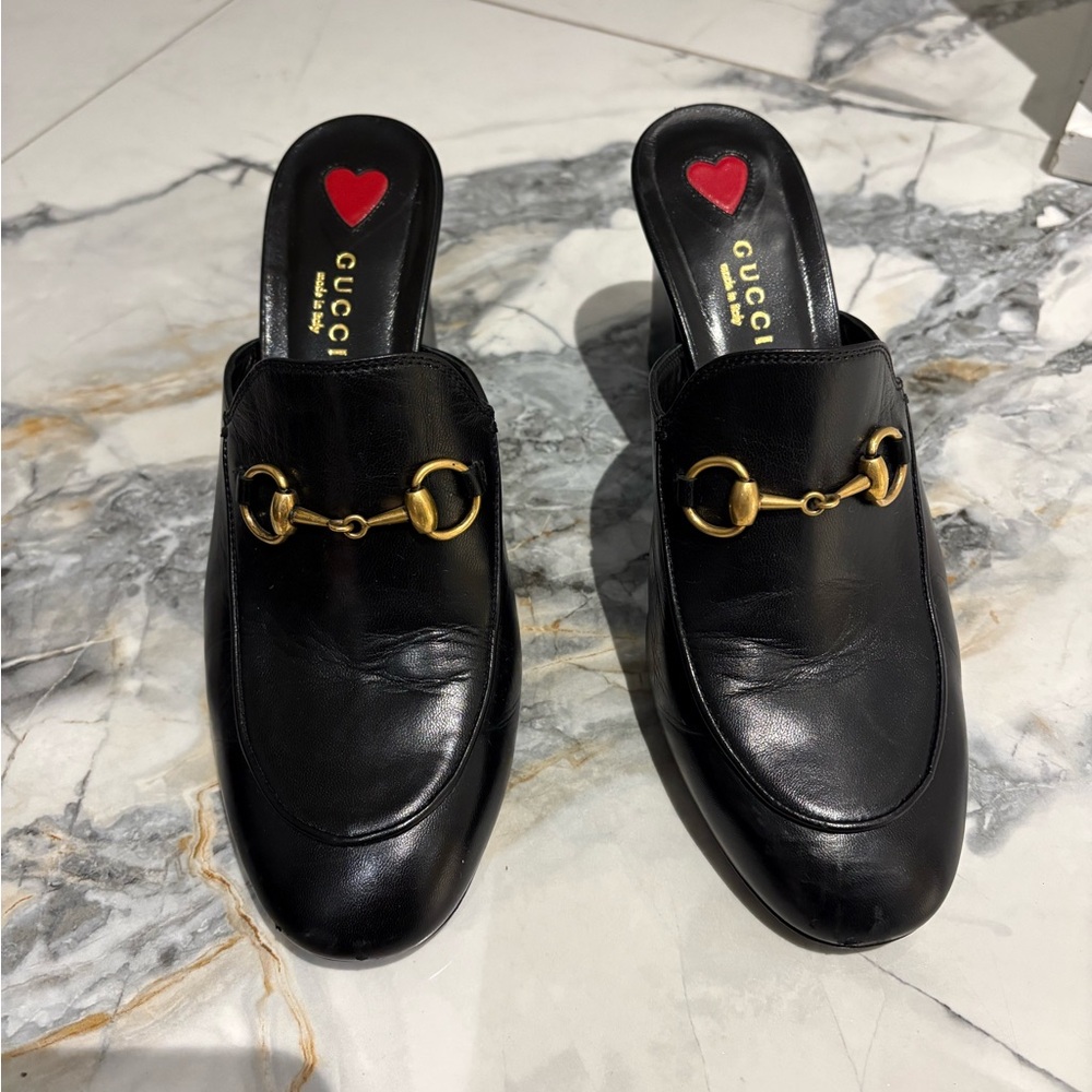 Gucci Black Leather Mules with Gold Accents